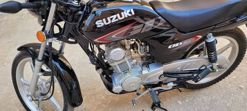 Suzuki 110 Karachi number first owner cplc clear 0