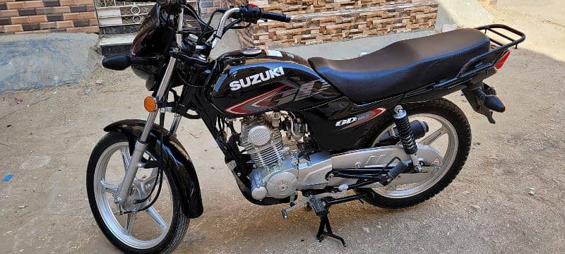 Suzuki 110 Karachi number first owner cplc clear 1