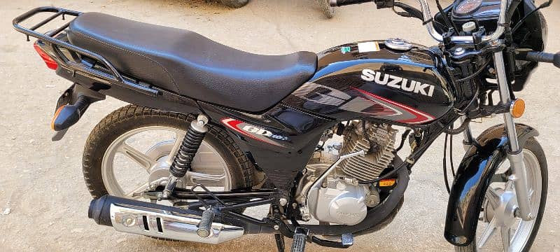 Suzuki 110 Karachi number first owner cplc clear 7