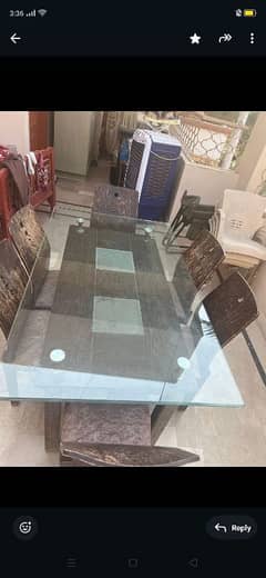 glass and wooden dinning table