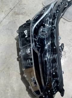 Toyota Fortuner original headlight 100%