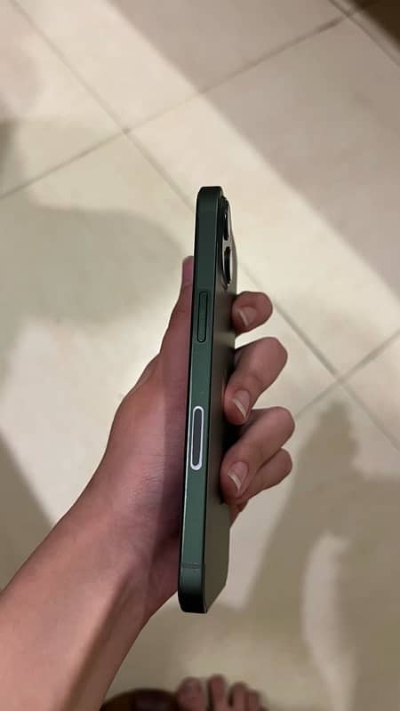 iPhone 13 jv green colour 10 by 10 condition 89 health128 gb waterpack 1