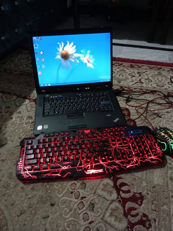 pc Thinkpad laptop with keyboard end mouse 1