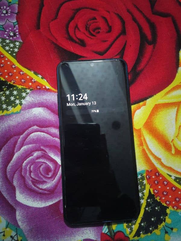 lgv60 thinq 5g non pta Black  colour. Minor scratches on back 0