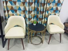 show peice type chairs and coffe table look like a new