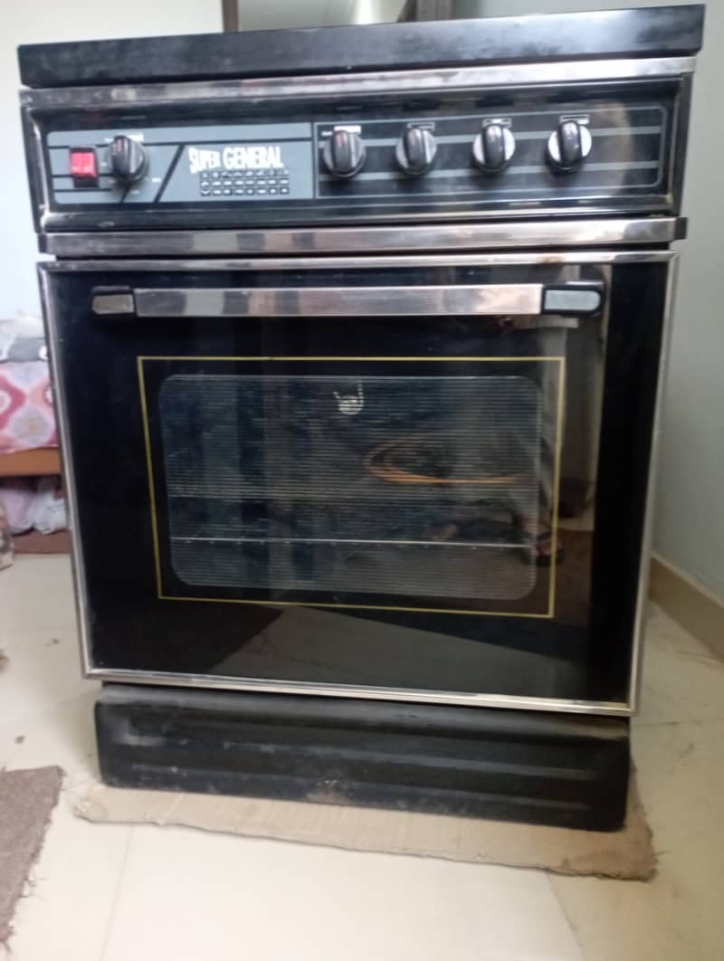 3 burner stove + oven branded 4