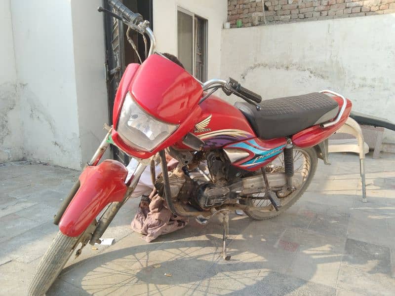 Honda 100 2014 model urgent sale lahore 1