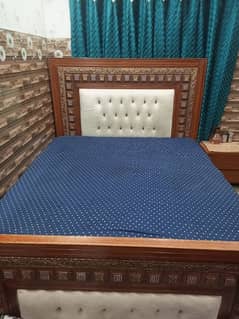 King size bed with side tables and dressing table