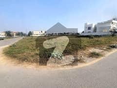 CORNER Of 2 Kanal Top Location Plot No- 84 Block G Phase 6 DHA Lahore For Urgent Sale