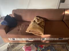 L shaped brown sofa