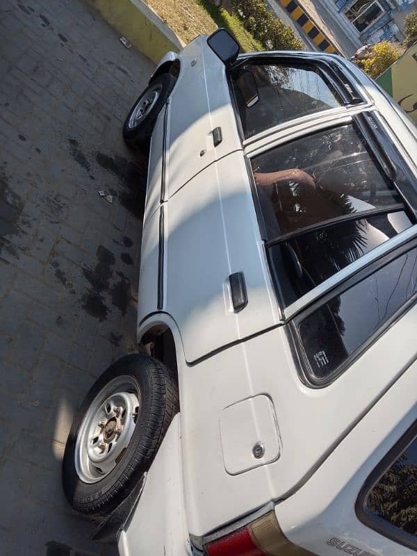 Suzuki Mehran VX 2013    zero Three zero six one 4 one 3 daball 2 one 3