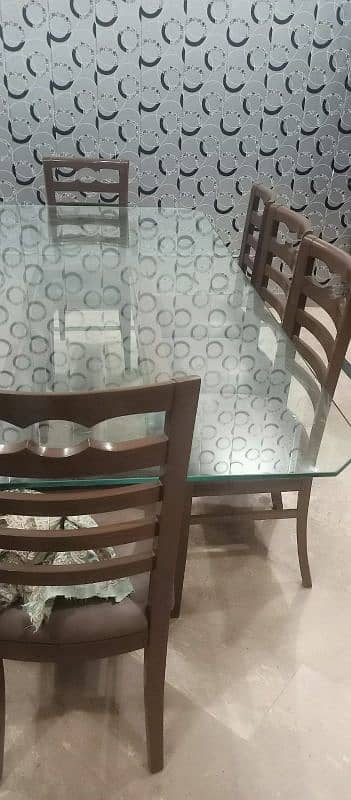 Wooden Glass Dining table with 8 chairs leather seated 1