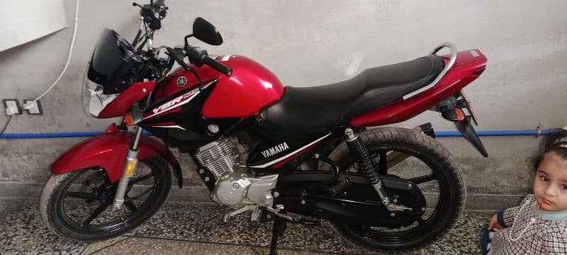 Red and Black Yamaha YBR 125 Model -2021 With Genuine Condition 0