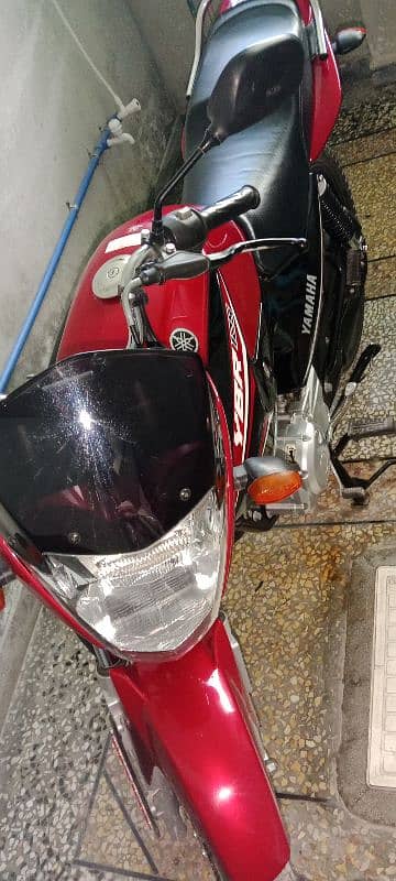 Red and Black Yamaha YBR 125 Model -2021 With Genuine Condition 4