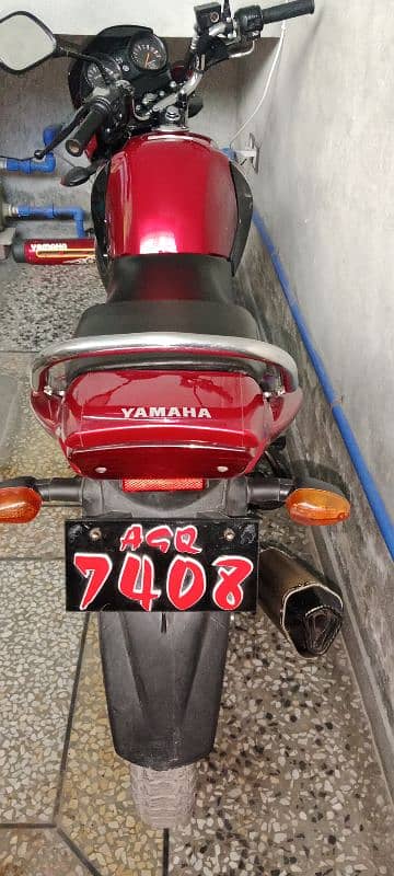 Red and Black Yamaha YBR 125 Model -2021 With Genuine Condition 6