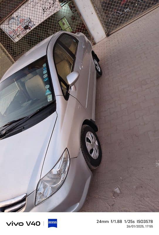 Honda Cityہونڈا سٹی 2006 ماڈل اندر سے ٹوٹل جینون باہر سے مکمل شاور ہ 3