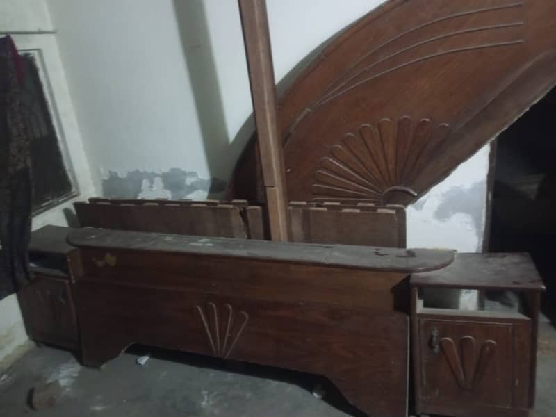 Antique Disassembled bed along with a sofa 0