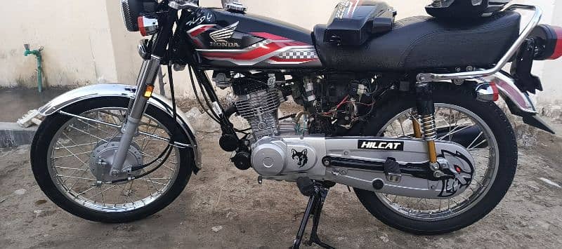 honda 125 blck clr urgent sale full new 03189498421 1