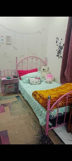 girls bed with dressing and side table all pink colour