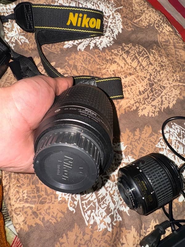 Nikon d5300 with 2 lenses. 8