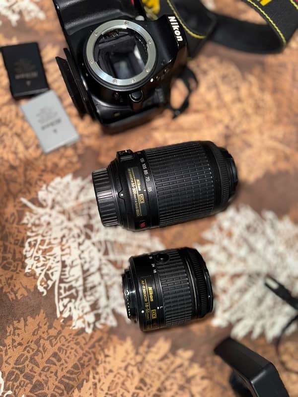 Nikon d5300 with 2 lenses. 10