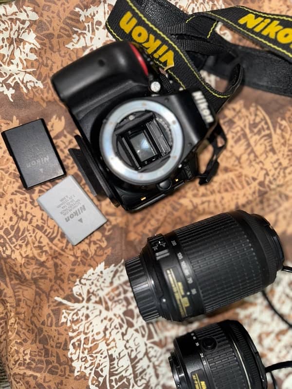 Nikon d5300 with 2 lenses. 14