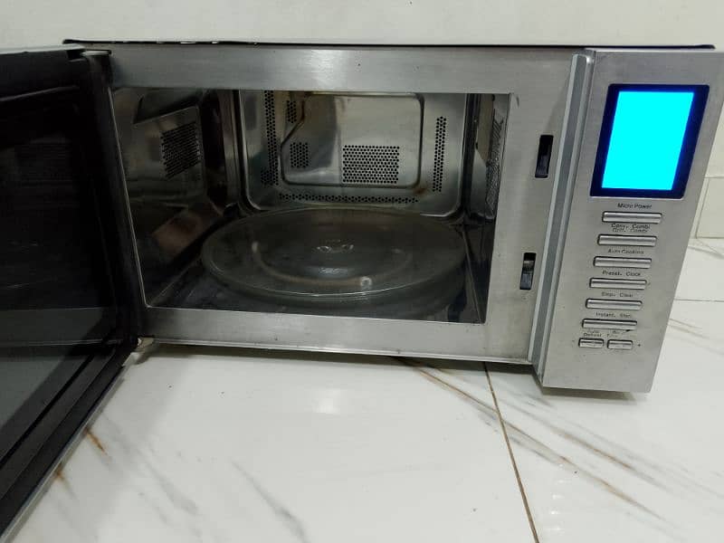 Haier 3 in 1 grill cooking baking microwave oven steel body 0