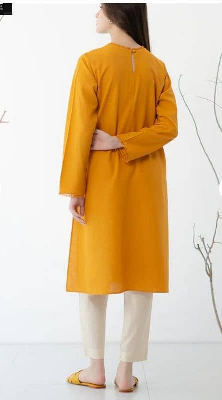 Mustard color elegant stitched kurti 0