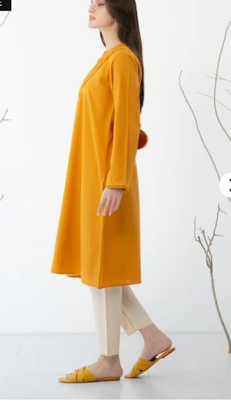 Mustard color elegant stitched kurti 2