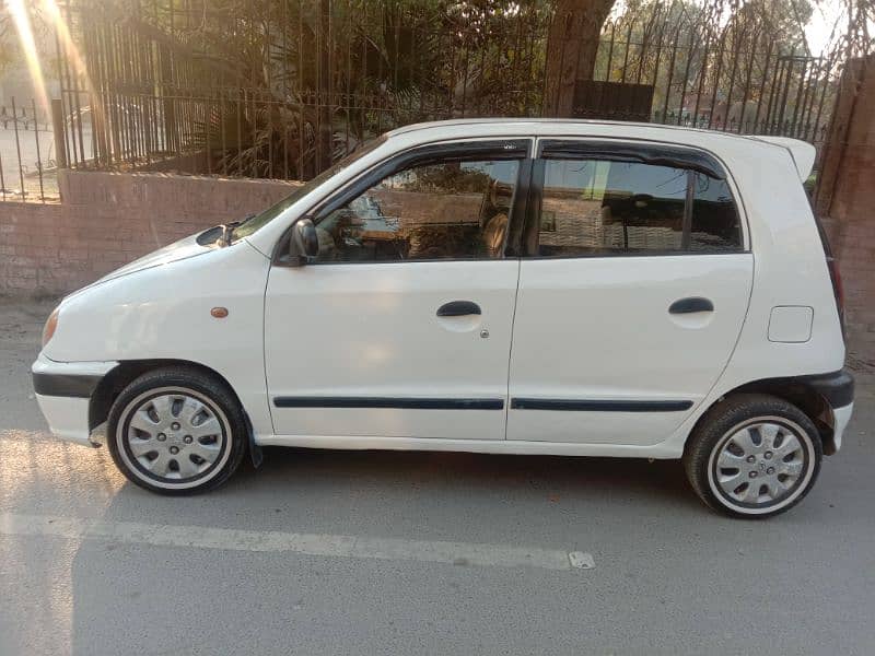 Hyundai Santro club 2004 model very well maintained family use car 12