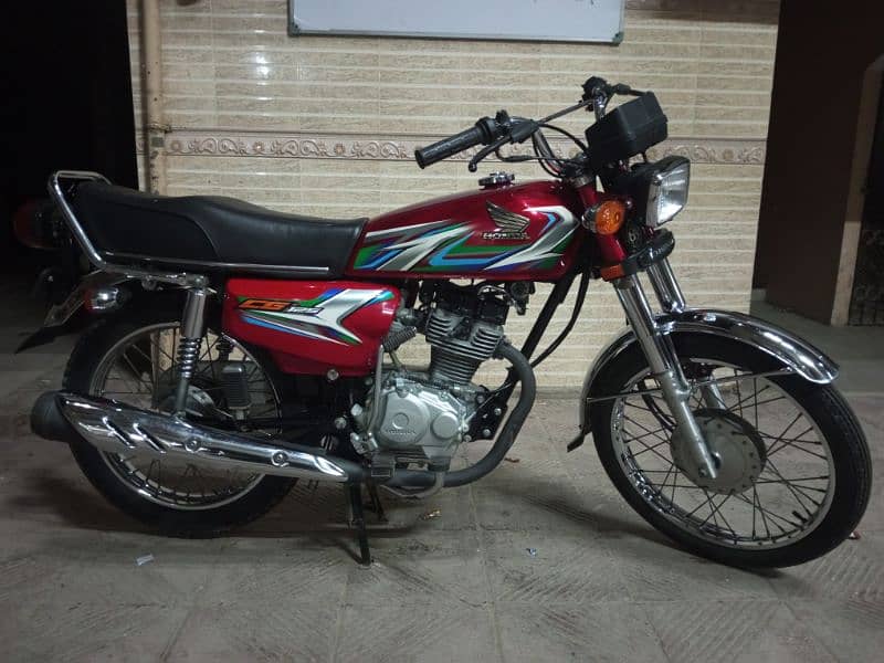 Honda 125 Karachi number 9