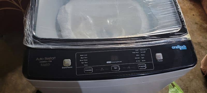 HAIER ONE TOUCH WASHING MACHINE 1