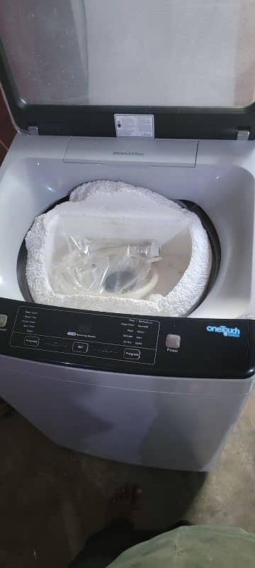 HAIER ONE TOUCH WASHING MACHINE 5