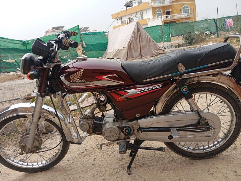 Honda 70 model 2006 engine wise okay condition 10 by 10 4