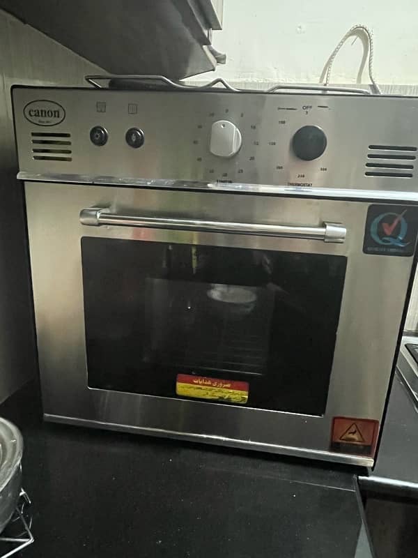 Gas oven nd grill cannon brand with box. 0