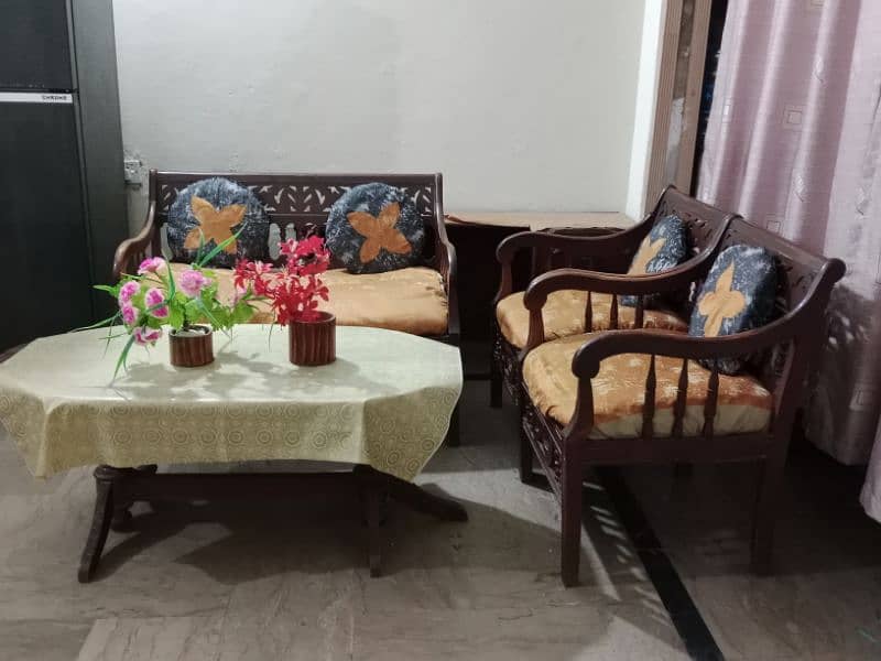 4 seater sofa ND 2 wooden table 1 iron table 3