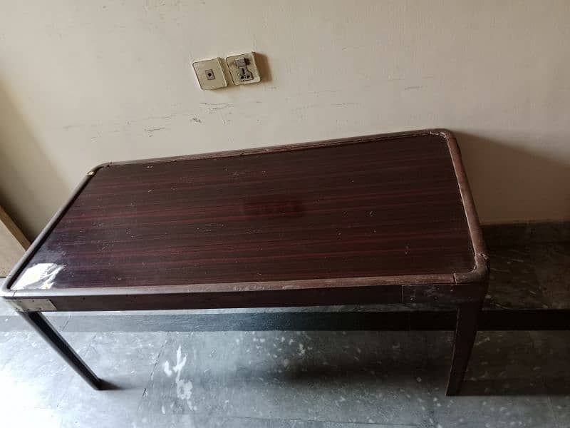 4 seater sofa ND 2 wooden table 1 iron table 4