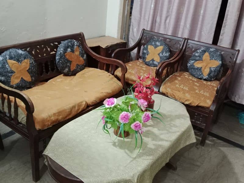 4 seater sofa ND 2 wooden table 1 iron table 5