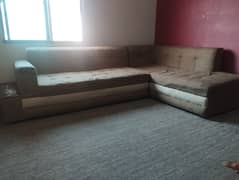 Sofa in good condition with sofa covers. Molty foam manufacturing.