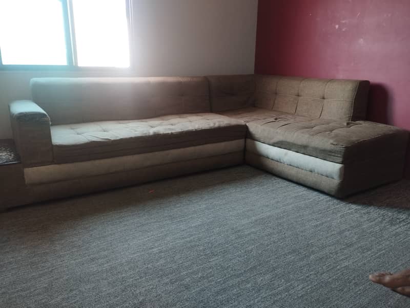 Sofa in good condition with sofa covers. Molty foam manufacturing. 1