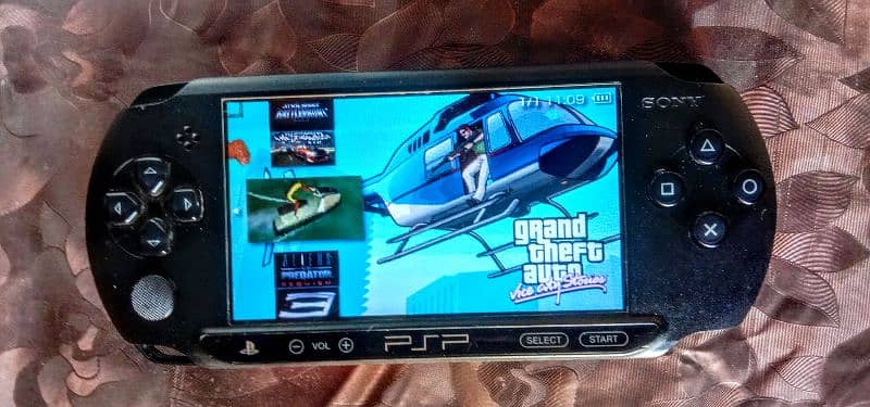 Sony Psp street jailbreak model with 64gb and lots of games 0