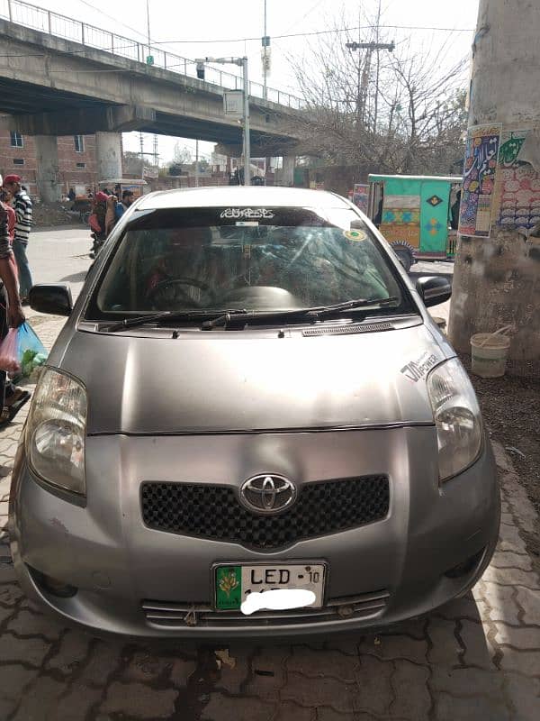 Toyota Vitz 2007 silver Lahore number bumper to bumper janin car 0