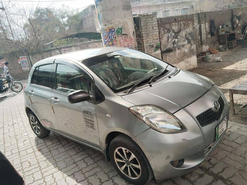 Toyota Vitz 2007 silver Lahore number bumper to bumper janin car 7