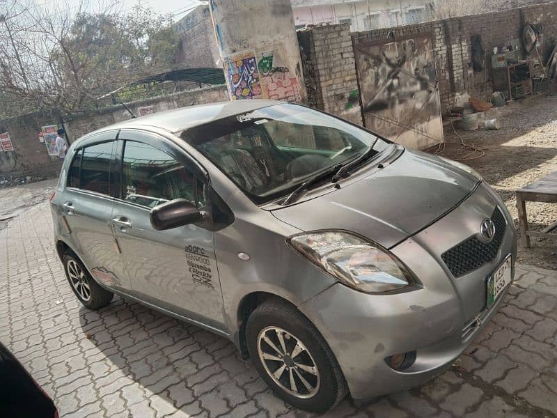 Toyota Vitz 2007 silver Lahore number bumper to bumper janin car 8