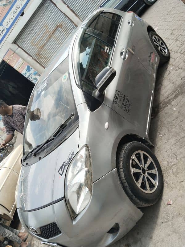 Toyota Vitz 2007 silver Lahore number bumper to bumper janin car 9