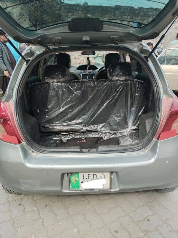 Toyota Vitz 2007 silver Lahore number bumper to bumper janin car 12