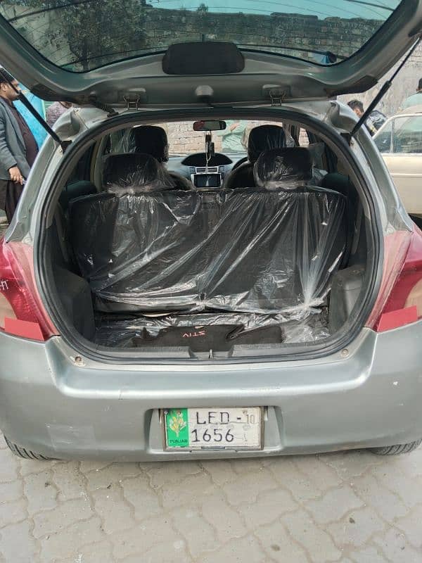 Toyota Vitz 2007 silver Lahore number bumper to bumper janin car 13