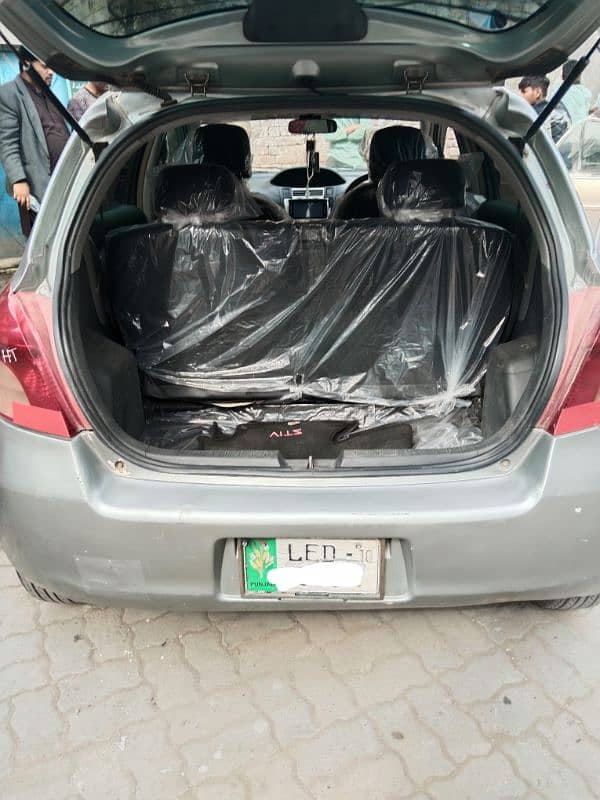 Toyota Vitz 2007 silver Lahore number bumper to bumper janin car 14