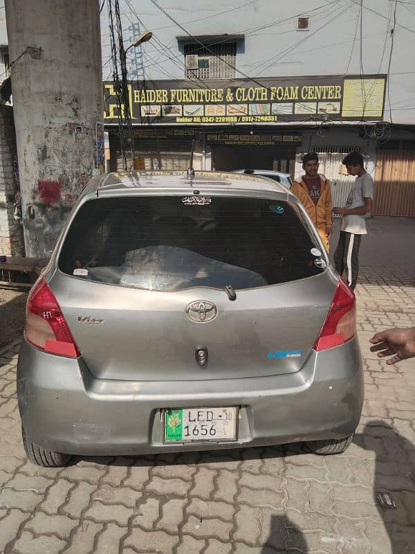 Toyota Vitz 2007 silver Lahore number bumper to bumper janin car 17