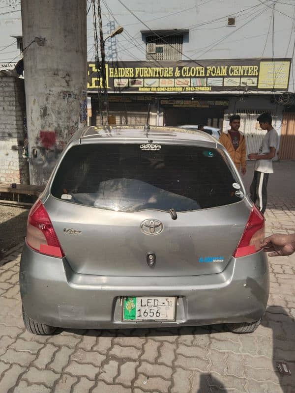 Toyota Vitz 2007 silver Lahore number bumper to bumper janin car 18